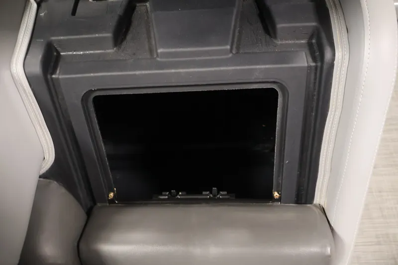 Slide: The Image of Storage compartment in 2021 Lowe SS 210 CL boat interior. - 15