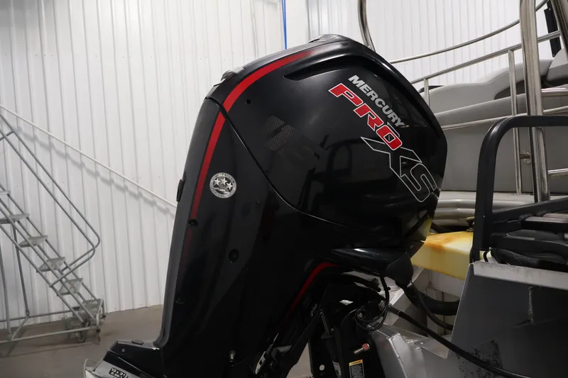 Slide: The Image of Mercury Pro XS outboard motor on 2021 Lowe SS 210 CL boat in indoor setting. - 33