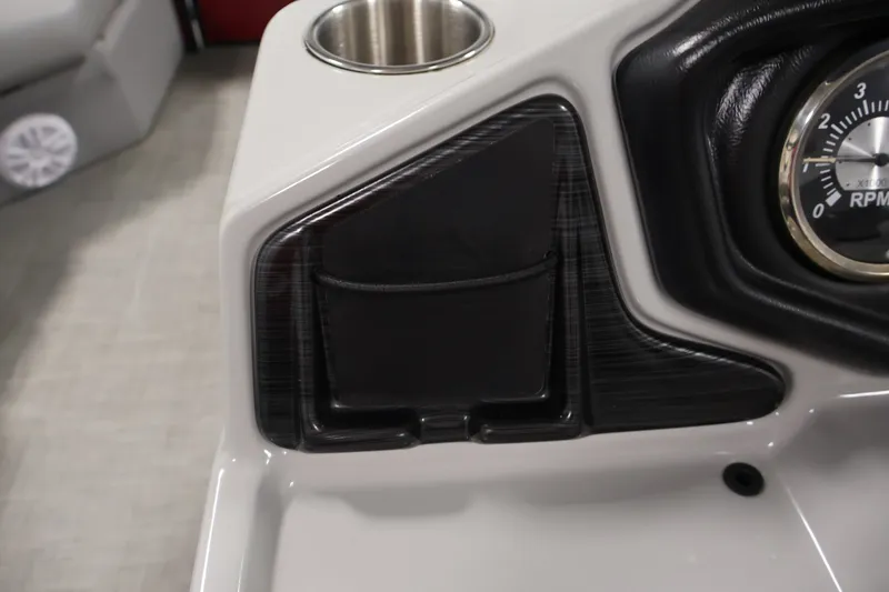 Slide: The Image of Dashboard of 2021 Lowe SS 210 CL boat with cup holder and RPM gauge. - 20