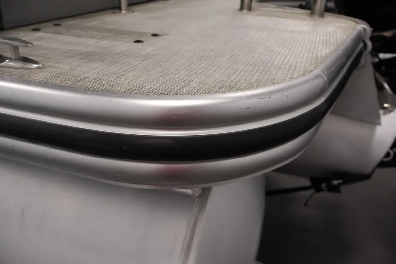 Slide: The Image of Close-up of 2021 Lowe SS 210 CL pontoon boat's aluminum deck edge. - 44