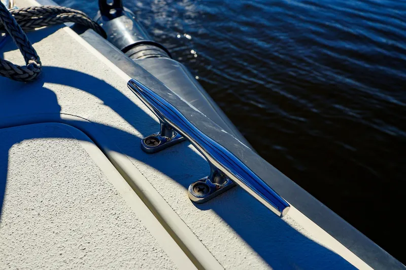 Slide: The Image of Close-up of a 2014 J Boats J/111 cleat on deck by the water. - 23