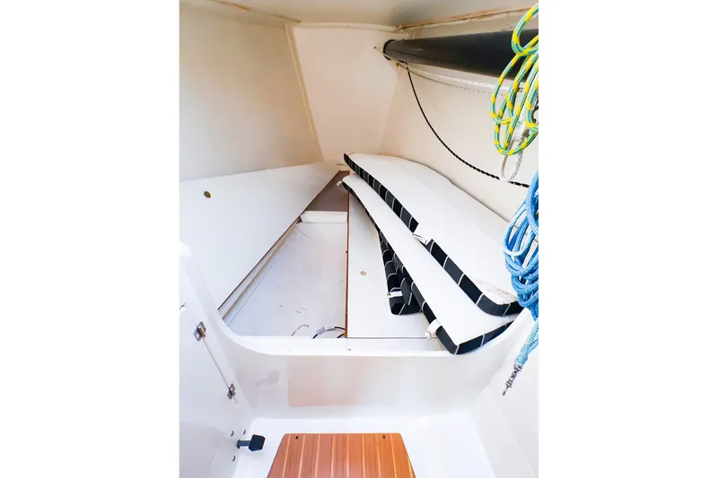 Slide: The Image of Interior view of 2014 J Boats J/111 sailboat with ropes and storage area. - 40