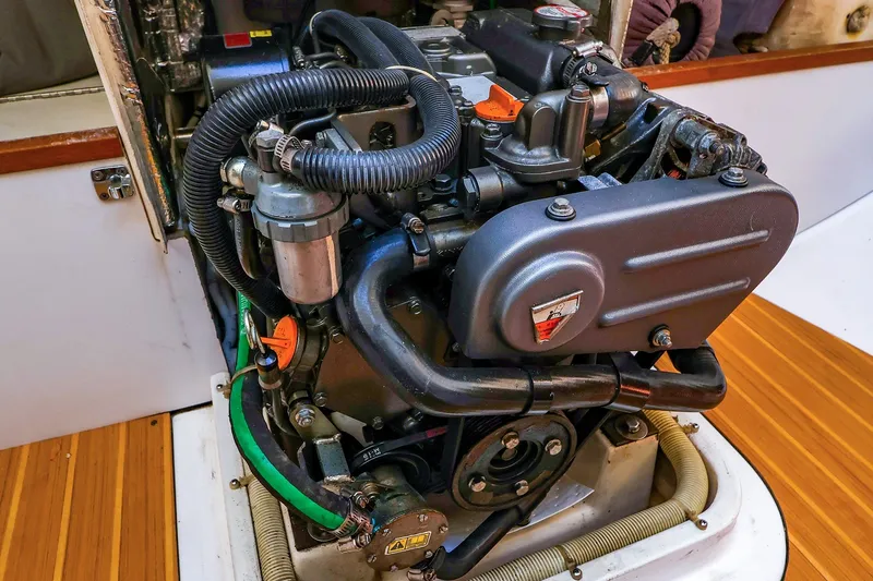 Slide: The Image of Engine of a 2014 J Boats J/111 sailboat, showcasing intricate mechanical components. - 45