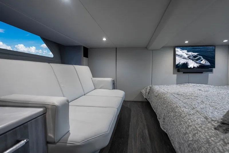 Slide: The Image of Luxurious interior of 2025 Formula 500 Super Sport Crossover yacht with sofa and TV. - 50