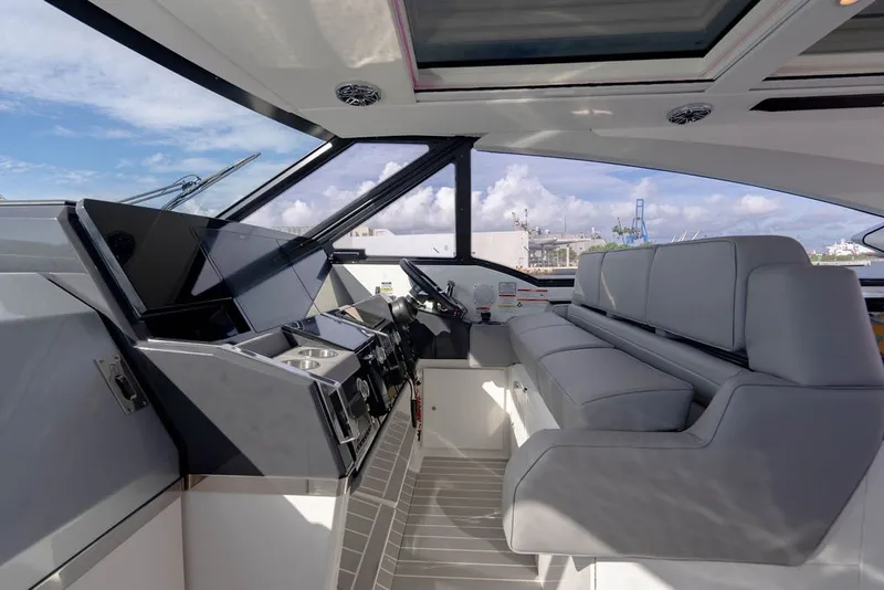 Slide: The Image of Interior of 2025 Formula 500 Super Sport Crossover yacht, featuring sleek design and modern controls. - 94