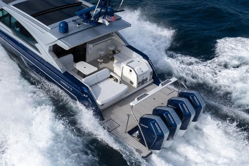 Slide: The Image of 2025 Formula 500 Super Sport Crossover yacht cruising on ocean waves. - 32