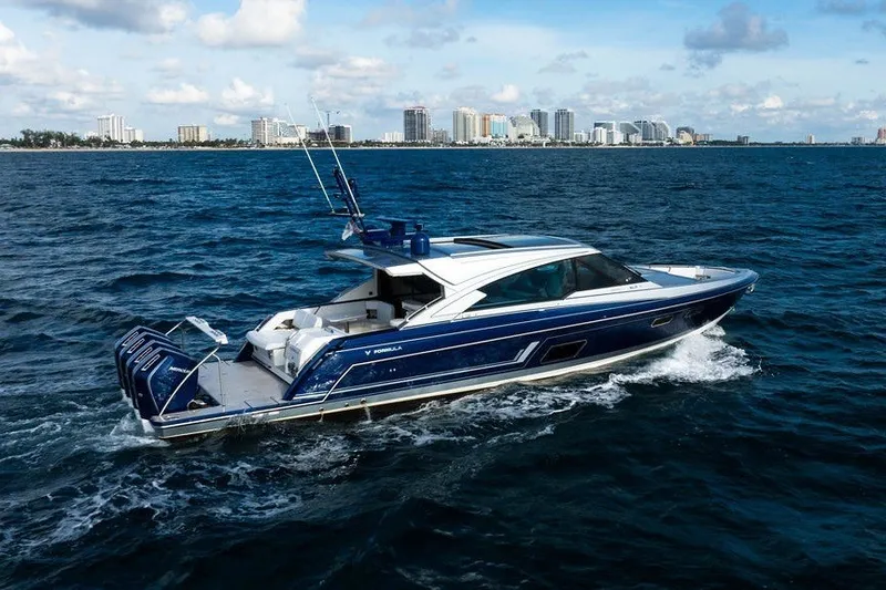 The Image of 2025 Formula 500 Super Sport Crossover yacht cruising on ocean near city skyline. - 0