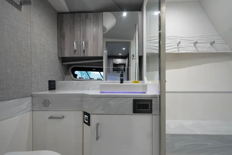 Slide: The Image of Modern bathroom interior in 2025 Formula 500 Super Sport Crossover yacht, featuring sleek cabinetry and fixtures. - 44