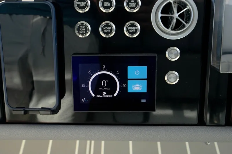 Slide: The Image of Control panel of 2025 Formula 500 Super Sport Crossover with Seakeeper display. - 87