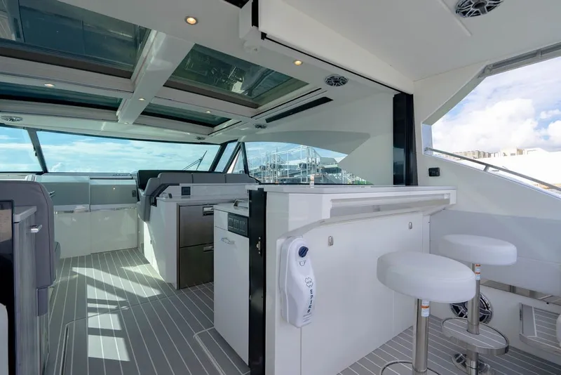 Slide: The Image of Luxurious interior of 2025 Formula 500 Super Sport Crossover yacht with modern design and seating. - 77