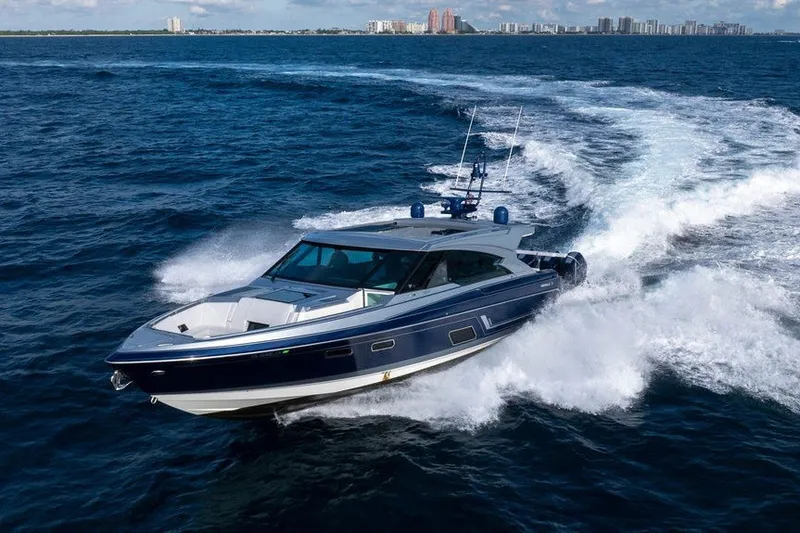 Slide: The Image of 2025 Formula 500 Super Sport Crossover yacht cruising on open water. - 20