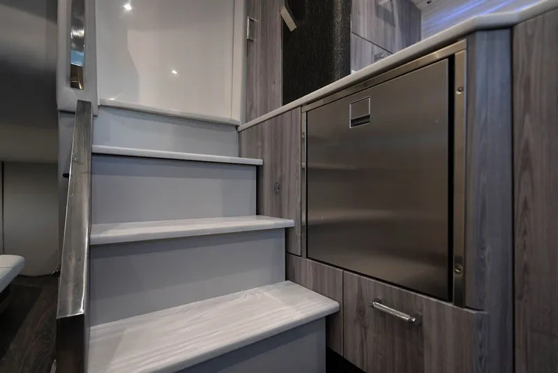 Slide: The Image of Interior stairs and cabinetry of 2025 Formula 500 Super Sport Crossover yacht. - 41