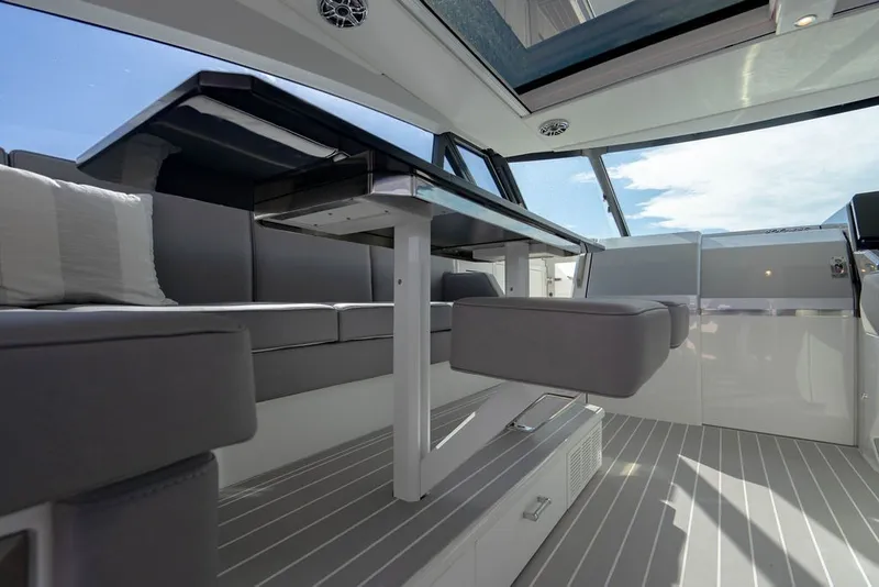 Slide: The Image of Interior of 2025 Formula 500 Super Sport Crossover boat with sleek seating and modern design. - 99