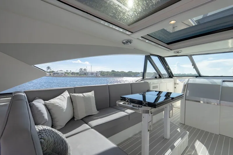 Slide: The Image of Luxurious interior of 2025 Formula 500 Super Sport Crossover yacht with waterfront view. - 81