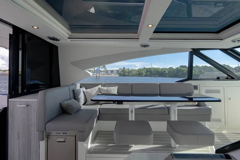 Slide: The Image of Luxurious interior of 2025 Formula 500 Super Sport Crossover yacht with panoramic windows. - 108