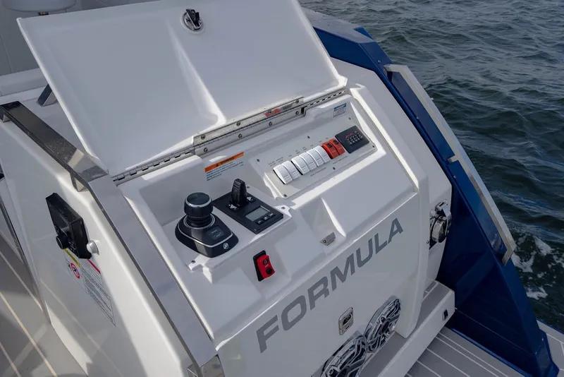 Slide: The Image of 2025 Formula 500 Super Sport Crossover control panel on a boat, featuring advanced navigation equipment. - 64