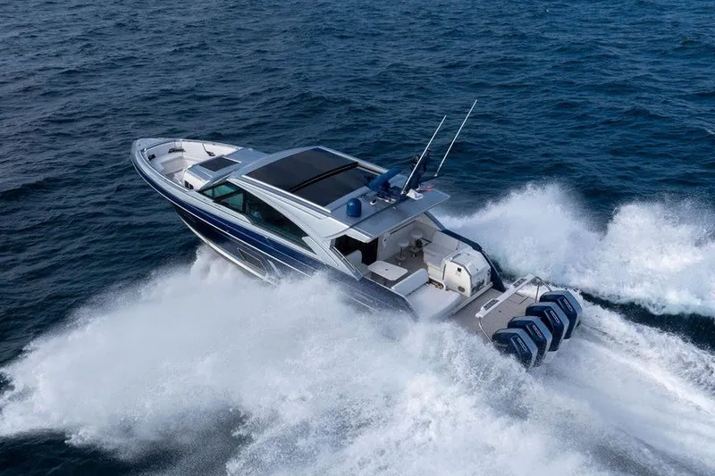 Slide: The Image of 2025 Formula 500 Super Sport Crossover speeding on open water, showcasing powerful engines. - 27