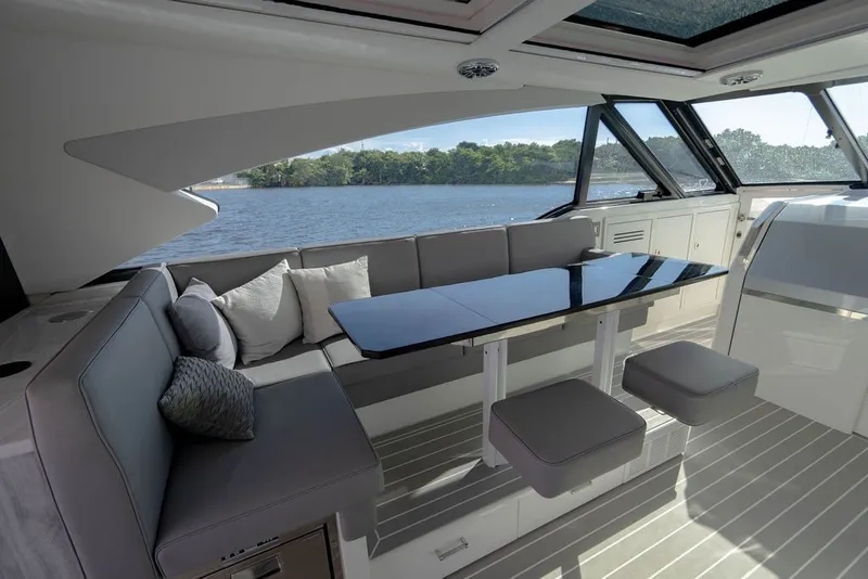 Slide: The Image of Luxurious interior of 2025 Formula 500 Super Sport Crossover yacht with sleek seating and table. - 107