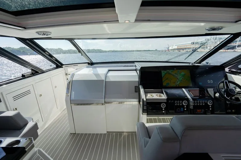Slide: The Image of Interior view of 2025 Formula 500 Super Sport Crossover yacht cockpit with advanced navigation system. - 82