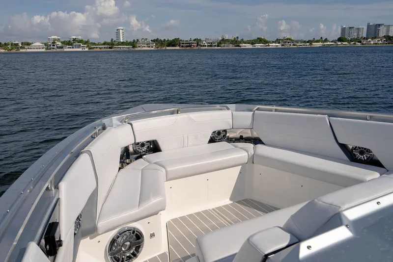 Slide: The Image of 2025 Formula 500 Super Sport Crossover boat interior with luxurious seating and scenic waterfront view. - 114