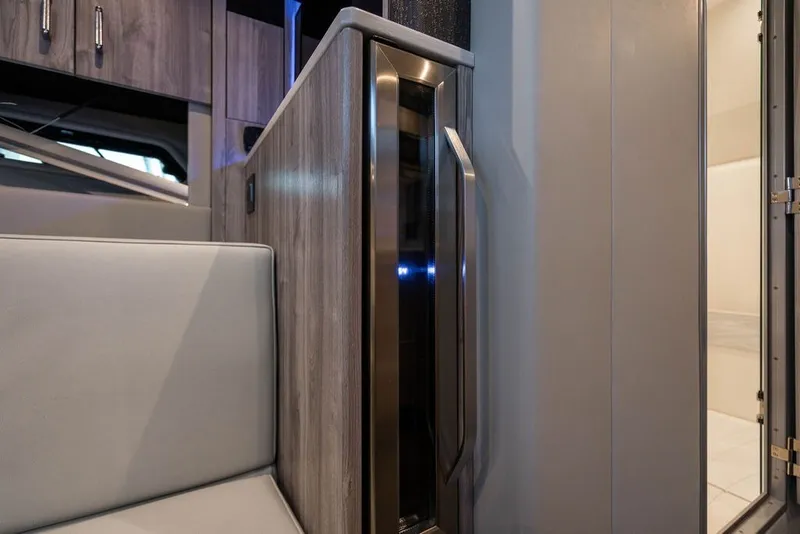 Slide: The Image of Interior of 2025 Formula 500 Super Sport Crossover, featuring sleek cabinetry and modern design. - 38