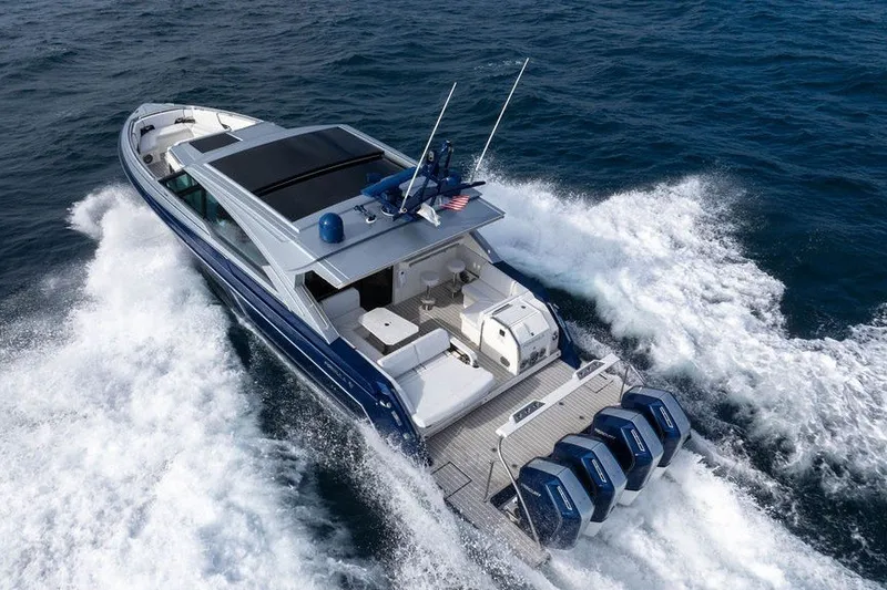 Slide: The Image of 2025 Formula 500 Super Sport Crossover cruising on open water, showcasing sleek design and powerful engines. - 31