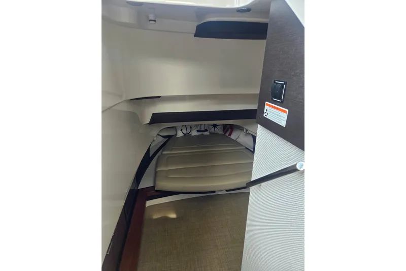 Slide: The Image of Interior cabin of 2018 Pursuit S 368 Sport boat, featuring seating and modern design. - 34