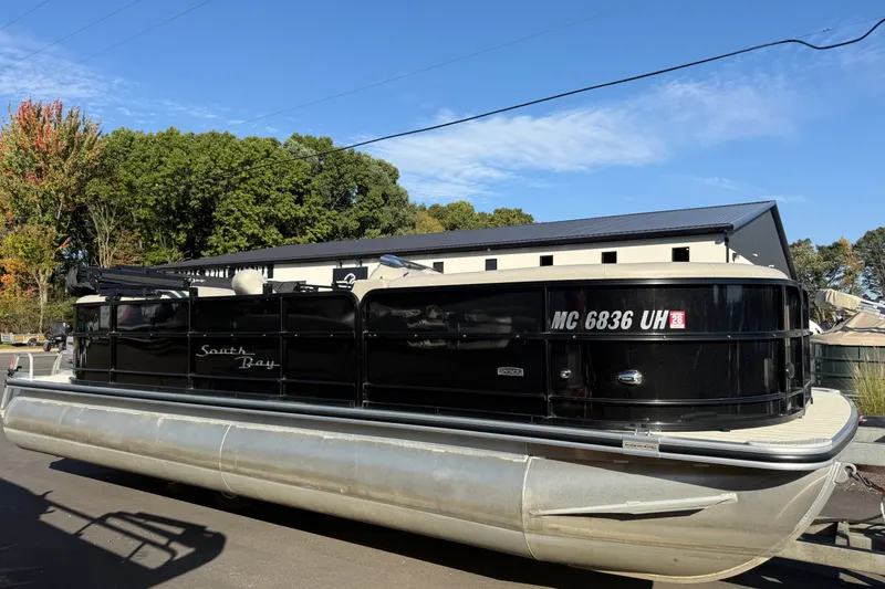 The Image of 2019 South Bay 224E pontoon boat parked outdoors on a sunny day. - 0