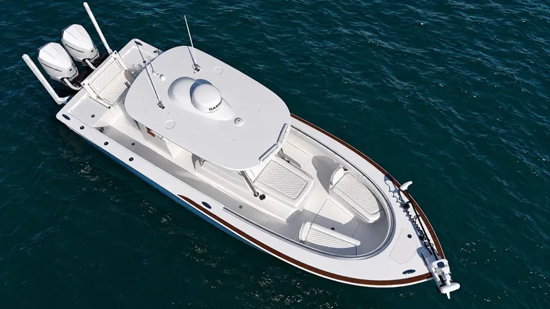 Slide: The Image of The 2025 Valhalla V-29 Hybrid is a sleek boat with twin outboard engines and a spacious deck. - 11