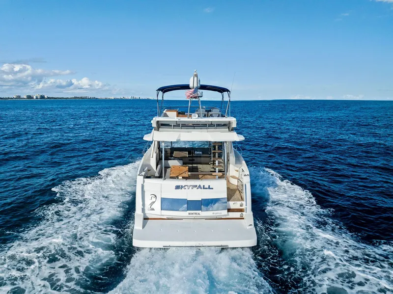 Slide: The Image of Absolute 55 FLY yacht cruising on open sea, 2013 model, rear view. - 16