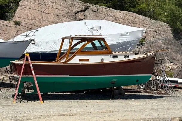 Slide: The Image of 1993 Webbers Cove Pemaquid Beach 26 boat on dry dock with ladder nearby. - 37