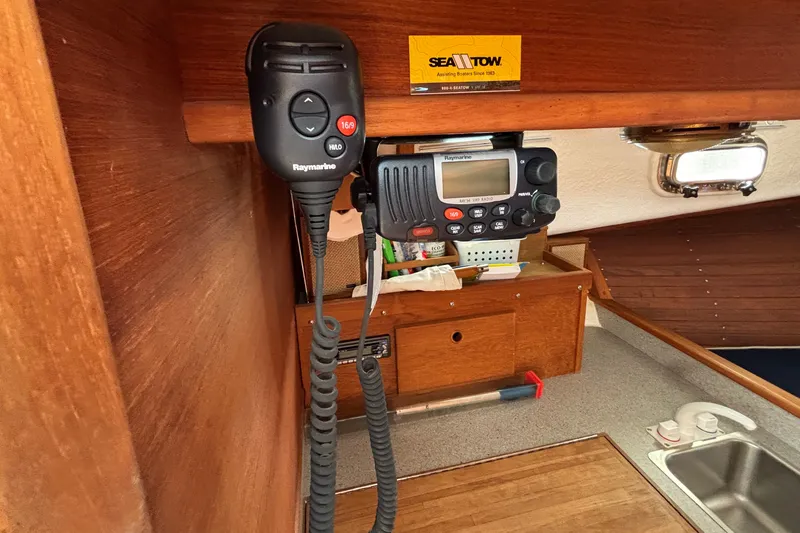 Slide: The Image of Interior of 1993 Webbers Cove Pemaquid Beach 26 with Raymarine VHF radio and Sea Tow card. - 29