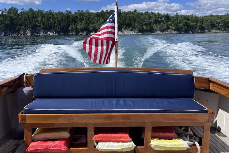 Slide: The Image of Webbers Cove Pemaquid Beach 26 boat, 1993, cruising with American flag, scenic water view. - 4