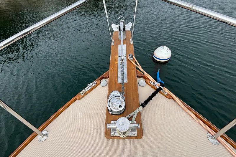 Slide: The Image of Bow of 1993 Webbers Cove Pemaquid Beach 26 with anchor and mooring buoy. - 35