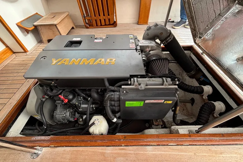 Slide: The Image of Engine compartment of 1993 Webbers Cove Pemaquid Beach 26 with Yanmar engine. - 25
