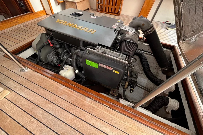 Slide: The Image of Engine compartment of a 1993 Webbers Cove Pemaquid Beach 26 with Yanmar engine. - 24
