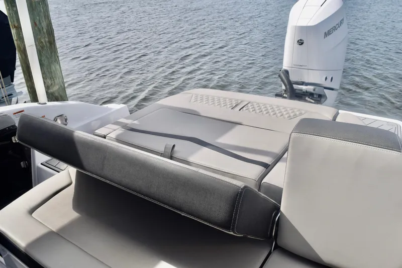 Slide: The Image of 2025 Monterey 275SS Super Sport boat with luxurious seating and powerful Mercury engine. - 47
