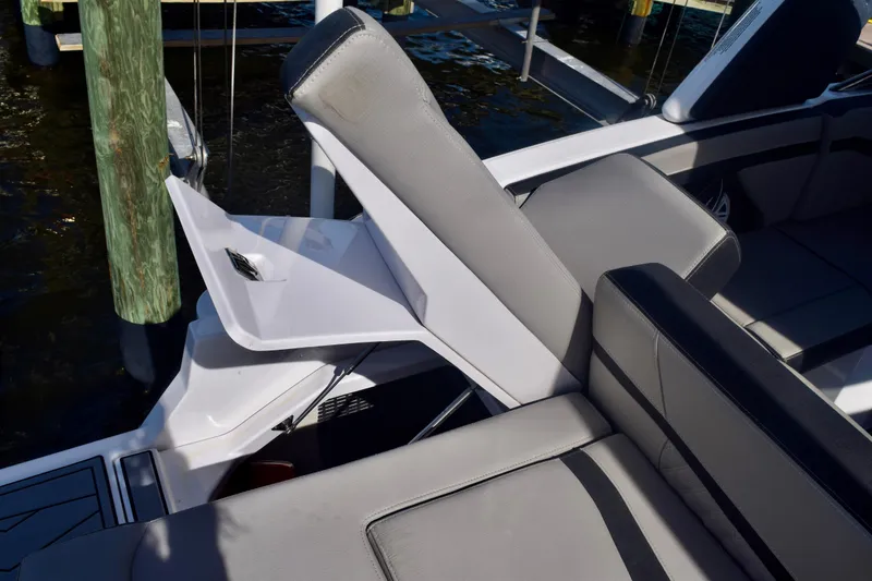 Slide: The Image of 2025 Monterey 275SS Super Sport boat interior with adjustable seating and sleek design. - 110