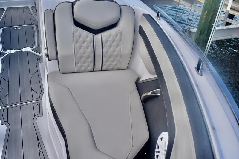 Slide: The Image of 2025 Monterey 275SS Super Sport boat interior with luxurious seating and modern design. - 70