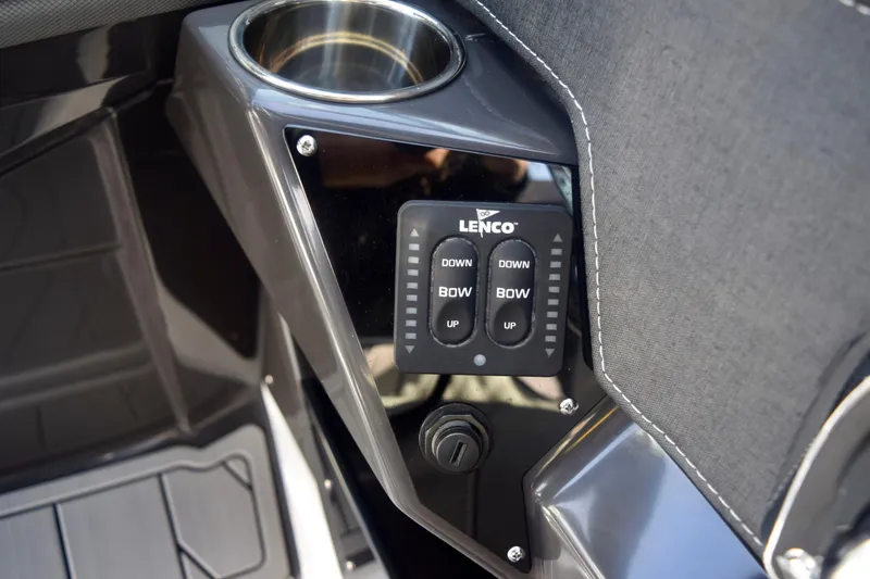 Slide: The Image of Control panel of 2025 Monterey 275SS Super Sport boat with cup holder. - 83