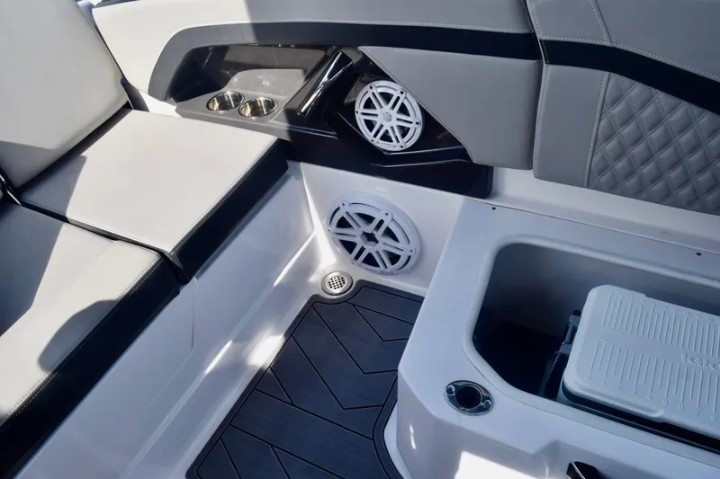Slide: The Image of Interior of 2025 Monterey 275SS Super Sport boat with speakers and seating. - 96