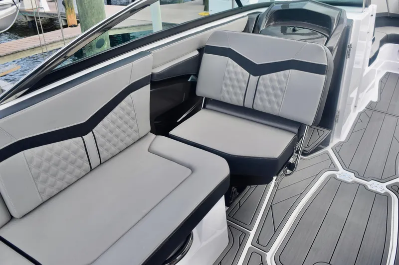 Slide: The Image of 2025 Monterey 275SS Super Sport boat interior with stylish seating and modern design. - 57