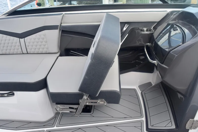 Slide: The Image of 2025 Monterey 275SS Super Sport boat interior with modern seating and sleek design. - 58
