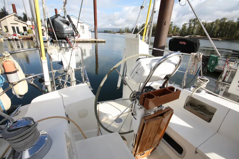 Slide: The Image of Cockpit view of 2001 Outbound 44/46 sailboat docked at marina. - 51