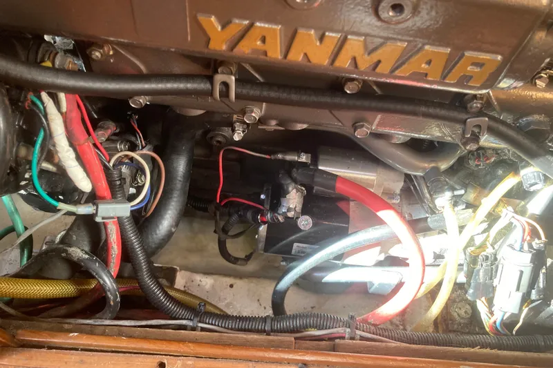 Slide: The Image of Engine compartment of a 2001 Outbound 44/46 yacht with Yanmar components and wiring. - 32