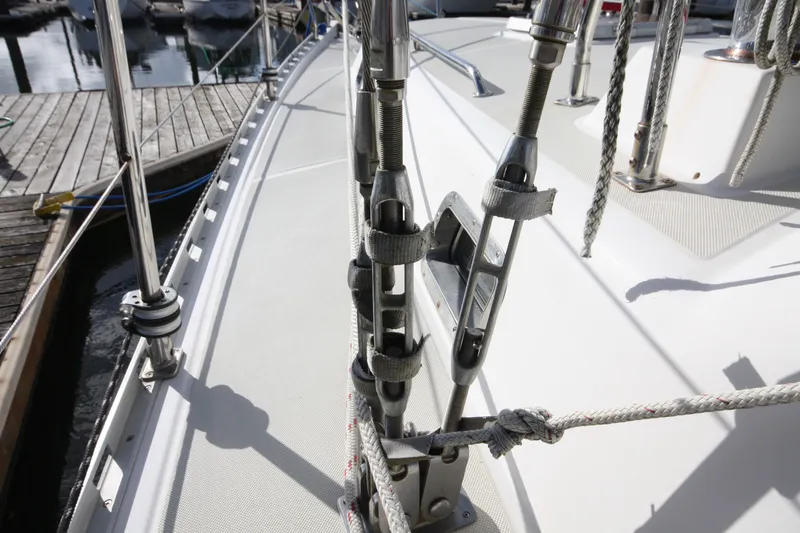 Slide: The Image of Close-up of 2001 Outbound 44/46 sailboat deck with rigging and ropes. - 52