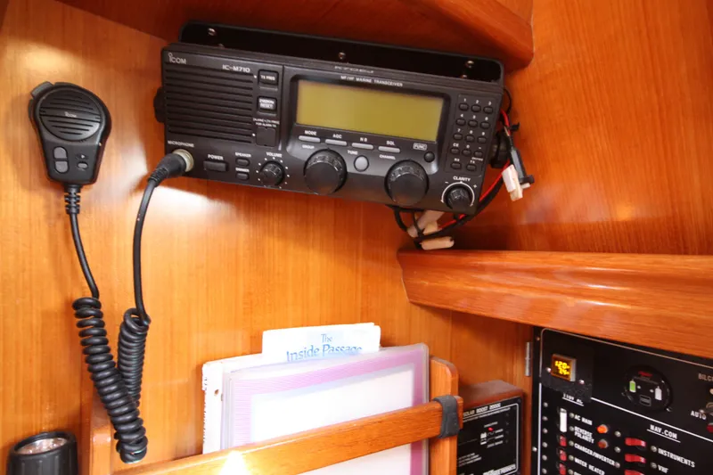 Slide: The Image of Radio equipment and control panel inside a 2001 Outbound 44/46 sailboat cabin. - 15
