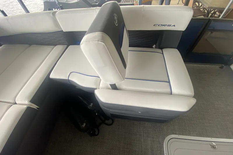 Slide: The Image of 2024 Barletta Corsa 25U boat interior with white and gray seating. - 35
