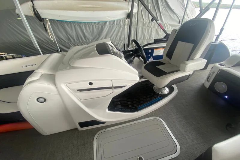Slide: The Image of 2024 Barletta Corsa 25U boat interior with modern helm and captain's chair. - 43
