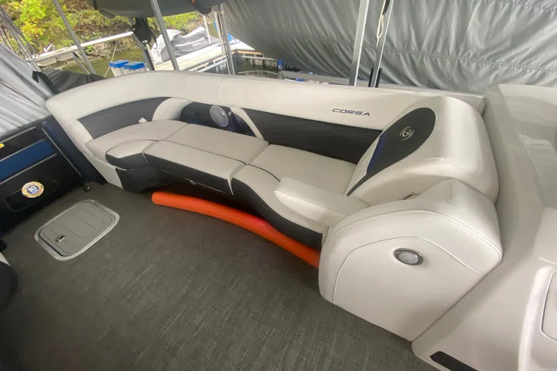 Slide: The Image of 2024 Barletta Corsa 25U boat interior with sleek seating and modern design. - 23